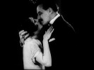 The Pleasure Garden (1925)Carmelita Geraghty, kiss and male profile